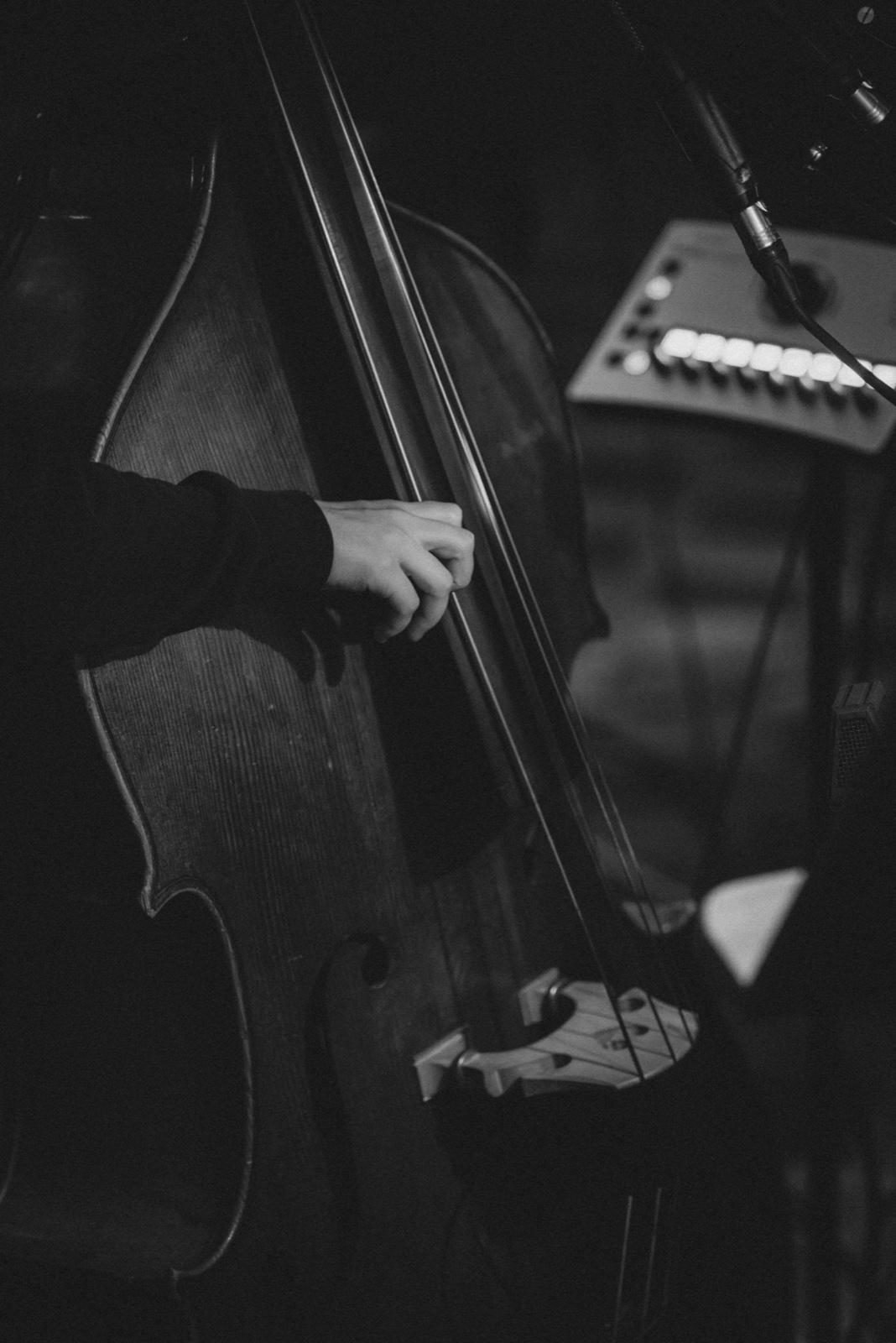 A close view of the double bass during Ingrid Schyborger’s studio session